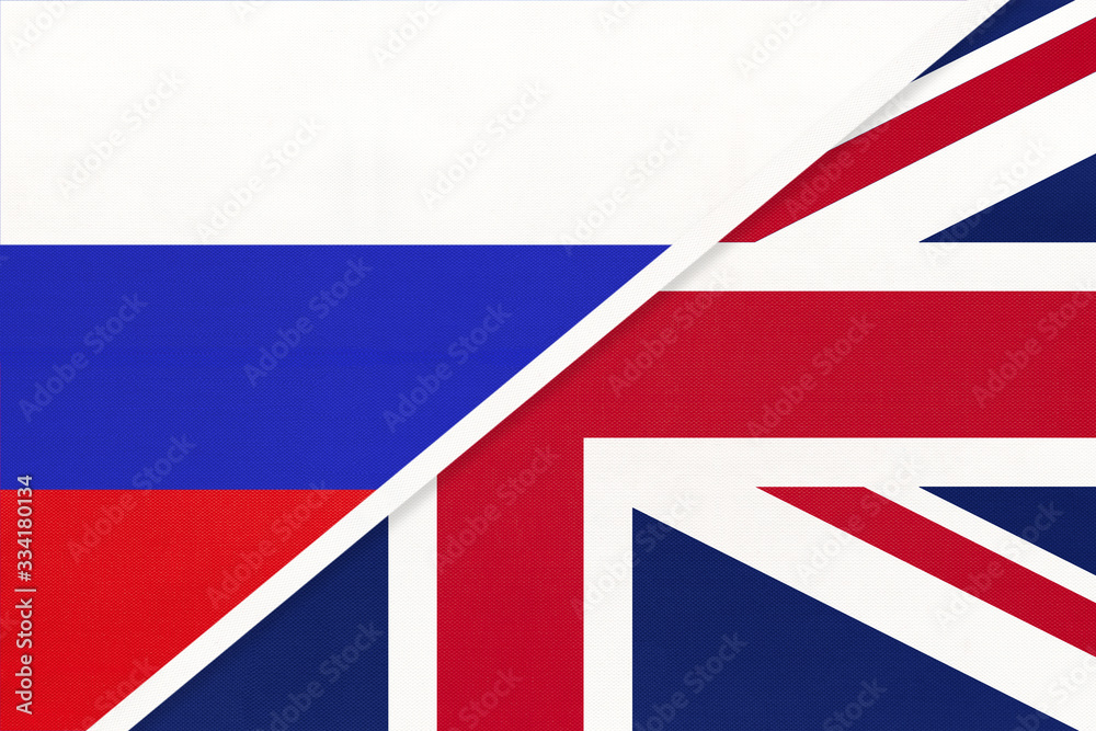 Russia vs United Kingdom of Great Britain national flag from textile. Relationship between two countries. Russia vs United Kingdom of Great Britain national flag from textile. Relationship between two countries.