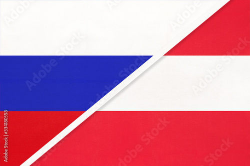 Russia vs Austria national flag from textile. Relationship and partnership between two countries.