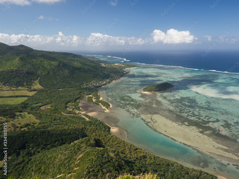 Turquoise lagoon view with the coast and the mountain in Mauritius Island offers a fantastic scenery