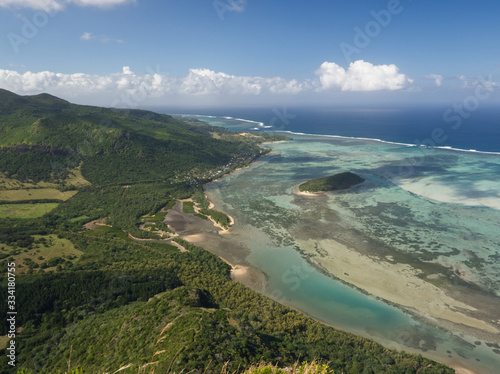 Turquoise lagoon view with the coast and the mountain in Mauritius Island offers a fantastic scenery