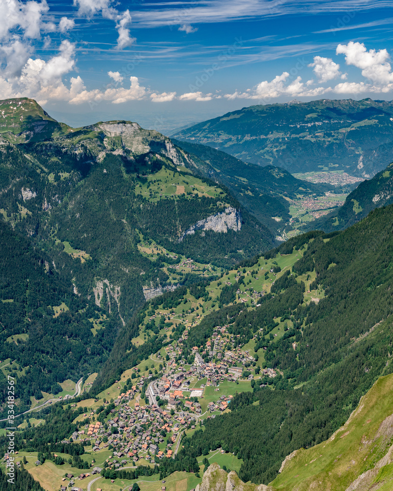 Fototapeta premium Switzerland, Panoramic view on Wengen and green Alps around