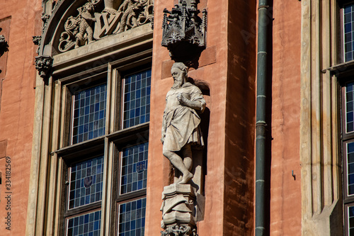 Sculpture with historical figures on the facade of the Town Hall in the city of Wroclaw in Poland