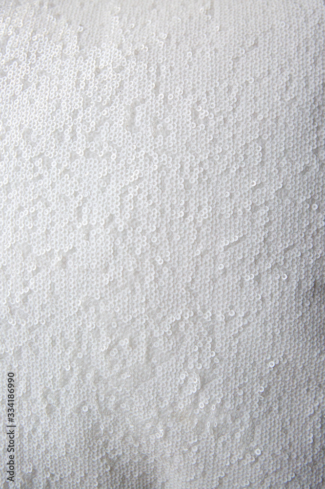 Texture of the surface of the fabric made of sequins. Texture of the surface of the fabric made of sequins.