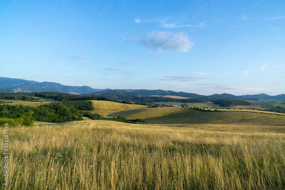 Sunrise or sunset over the hills and meadow. Slovakia