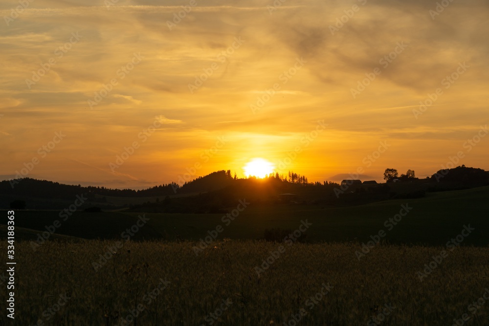 Sunrise or sunset over the hills and meadow. Slovakia