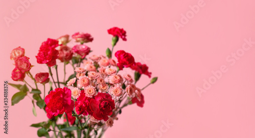 Wallpaper Mural Red and pink flowers on a pink background. The photo is suitable for sending greetings. Torontodigital.ca