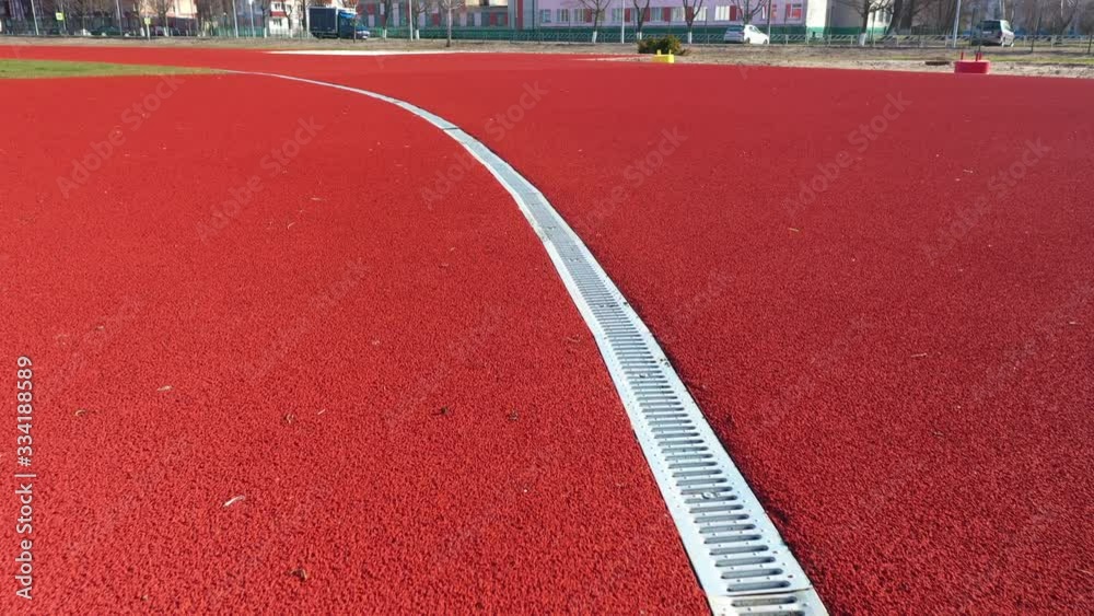 Water disposal in the stadium. Playground drainage system. Drainage