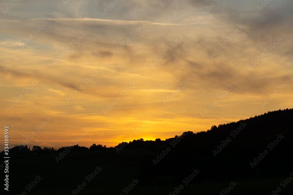 Sunrise or sunset over the hills and meadow. Slovakia