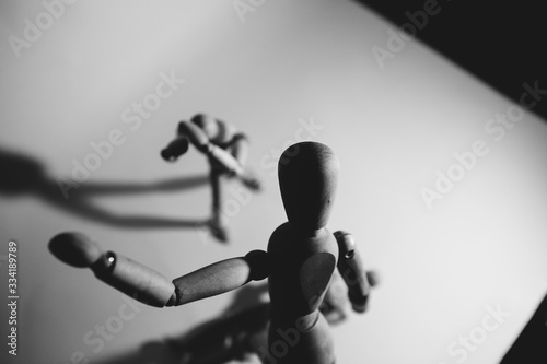 Manipulative Person.Eerie puppeteer hands controlling you. photo