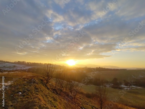 Sunrise or sunset over the hills and meadow. Slovakia	
