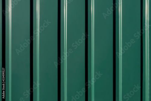 Background, texture of the protective metal cladding.