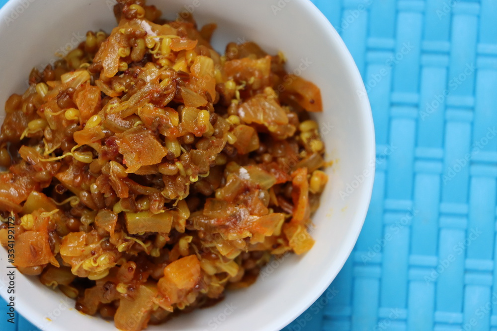 Matki Usal is a very common, vegan and healthy Maharashtrian dry curry (sabzi) made using sprouted matki or moth beans, protein rich, traditional Indian dish 