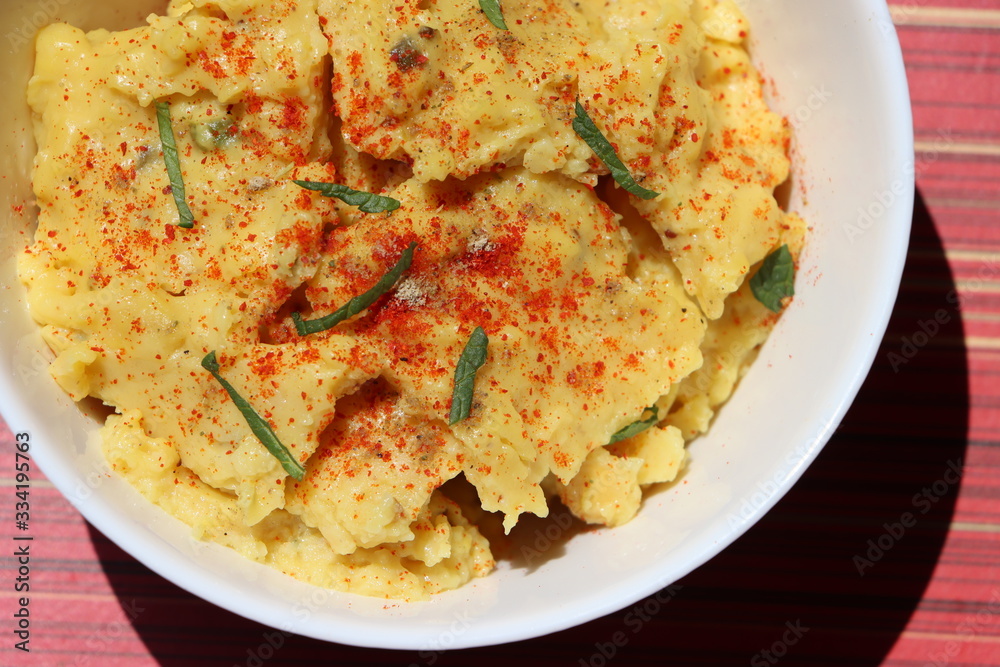 Jhunka or Zunka or pithale, a chickpea flour porridge, a vegetarian traditional Indian dish prepared in Maharashtra, Goa and Karnataka part of India Jhunka or Zunka or pithale, a chickpea flour porridge, a vegetarian traditional Indian dish prepared in Maharashtra, Goa and Karnataka part of India