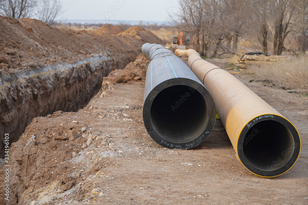 The new propylene pipeline DN 350 and DN 500 prepared for laying in a trench and for pumping oil and gas for an oil refinery The new propylene pipeline DN 350 and DN 500 prepared for laying in a trench and for pumping oil and gas for an oil refinery