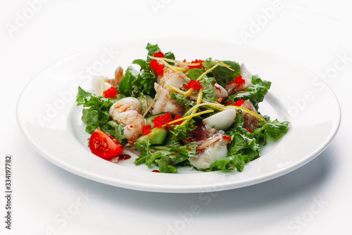 salad with herbs and caviar