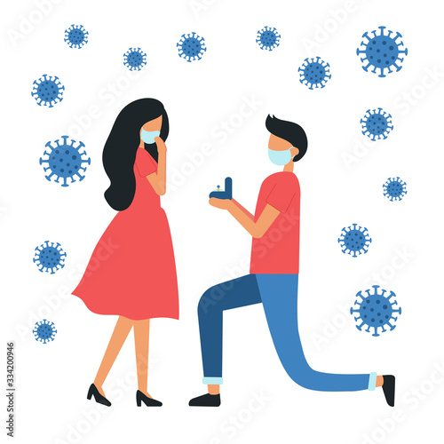 Loving couple with medical masks on their faces. Around coronaviruses. Man makes marriage proposal