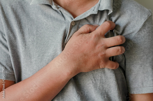 Man suffering from chest pain heart attack. Healthcare and medical concept. © jajam_e