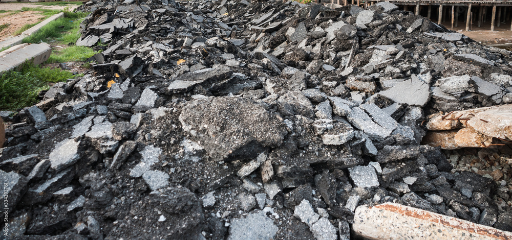 scrap of asphalt concrete that has been removed from the road scrap of asphalt concrete that has been removed from the road