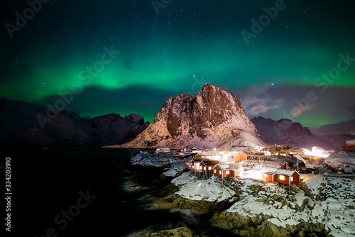 The Northern Lights over Hamnoy Island which is the one of the most popular place in Lofoten Island, Norway © Wit.Siri