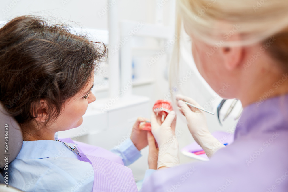Orthodontist explains effect of the dental brace