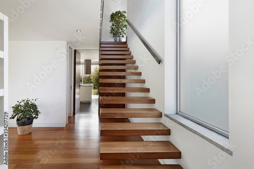 Apartment entrance hall with wooden staircase access to upper floor, design, furniture, home, modern, sea, wooden