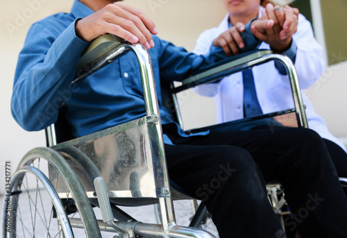 Physical therapist Disabled wheelchair with professional care.concept