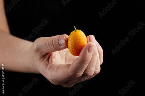 Kumquat , small oval citrus fruits, nagami variety photo