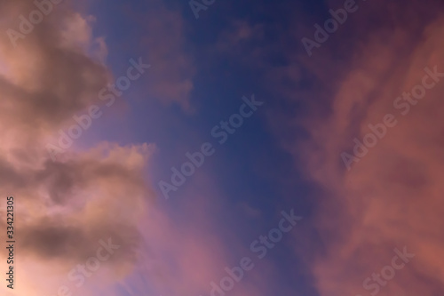 The sky in beautiful colors at sunset with a few clouds