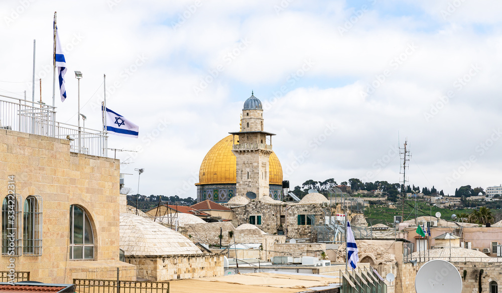 The Bab al-Silsila minaret and the Dome of the Rock are on the Temple Mount in the Old Town of Jerusalem in Israel