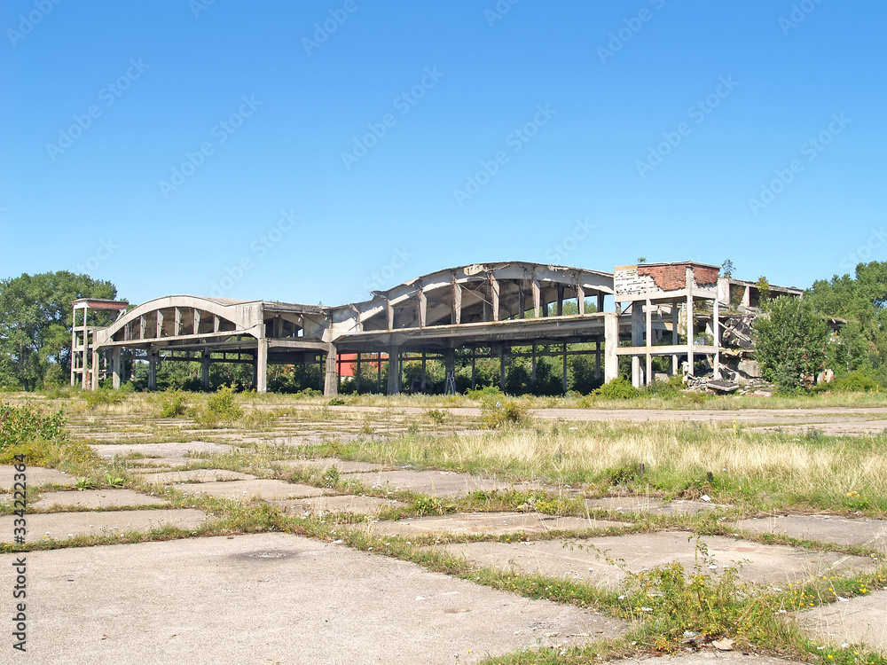 Obraz premium Ruins of aircraft hangars of the old German airfield Noitif. Baltiysk, Kaliningrad region