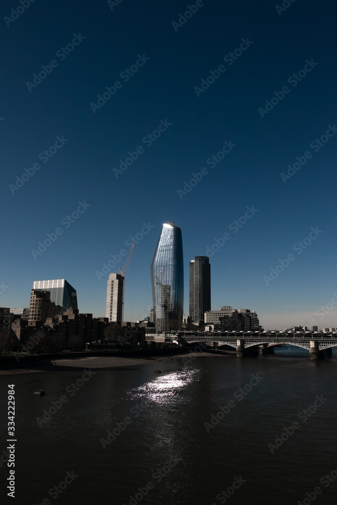 Wide shot of One Blackfriars over the Thames and the Blackfriars bridge