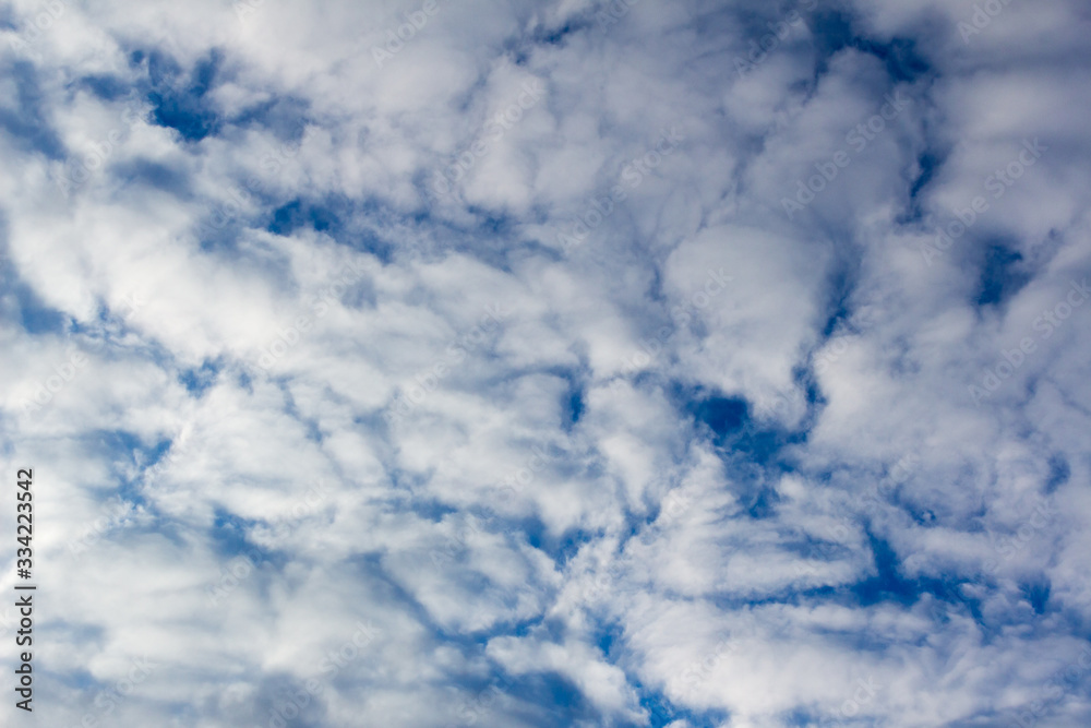 white clouds against blue sky