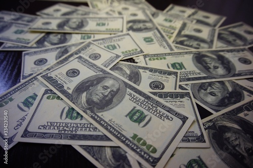 One hundred dollars bills. American money. photo
