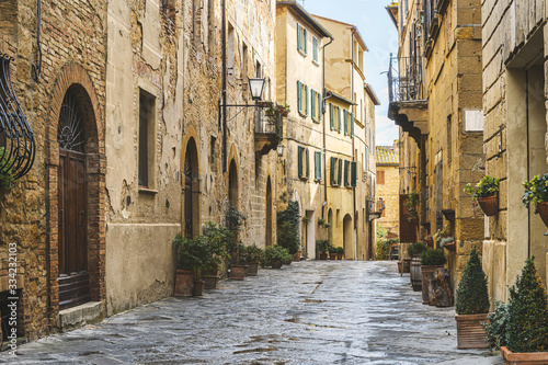 Fototapeta Naklejka Na Ścianę i Meble -  Walk on a rainy day through the streets of the beautiful town, Pienza, Tuscany