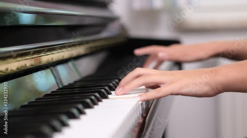 close up of someone playing piano