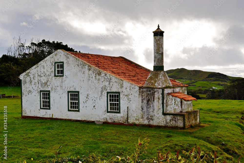 Typical house architecture on pastures in the Azores Typical house architecture on pastures in the Azores