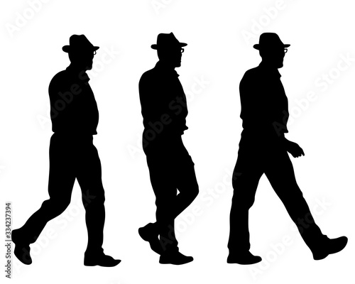 Elderly man in a hat is walking down the street. Isolated silhouette on a white background