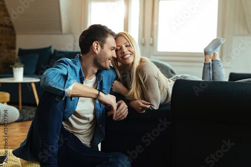 Young couple in love enjoying in their time together at home. © Drazen