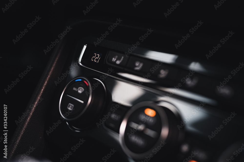 Color detail with the air conditioning button inside a car. Car interior. Car air condition.