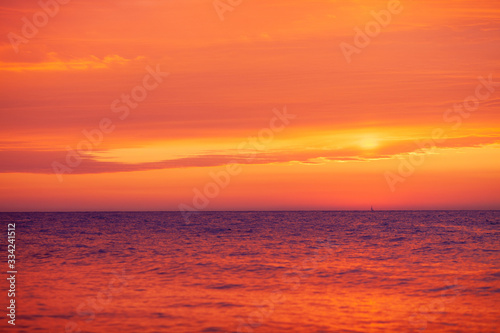 beautiful red-orange sunset on the sea  colorful sky and sea  magical landscape