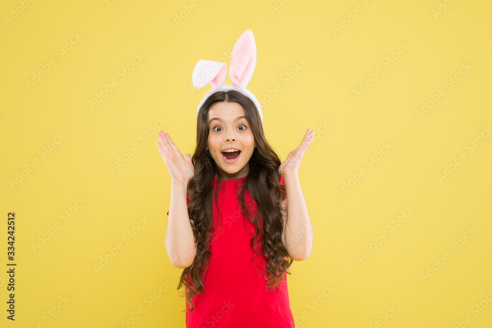 Unbelievable news. Little child celebrate Easter. Small child Easter style. Bunny child. Girl child wear rabbit ears. Spring season. Holiday celebration. Charismatic baby advertising easter topic