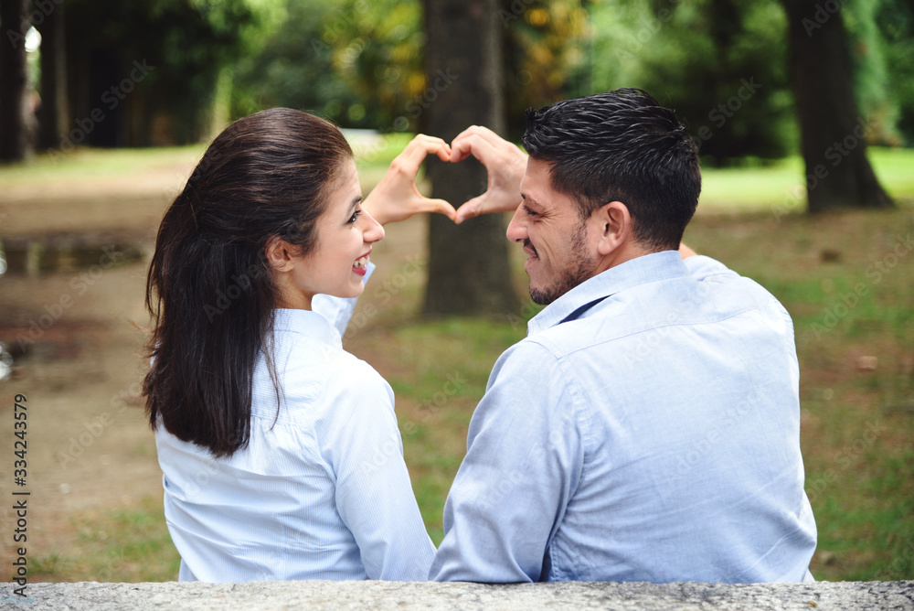 Fototapeta premium Heart Shaped Hands from a Cute Couple