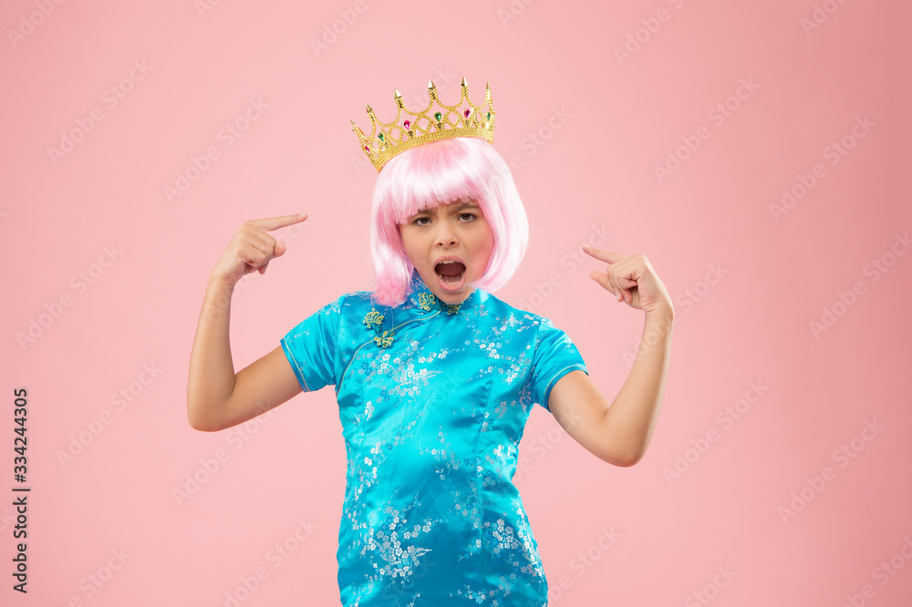 She is princess. Capricious little princess. Small girl pointing fingers at crown. Beauty princess in chinese style. Princess hair and beauty. Hair salon. Fashion accessories and style. Luxury look
