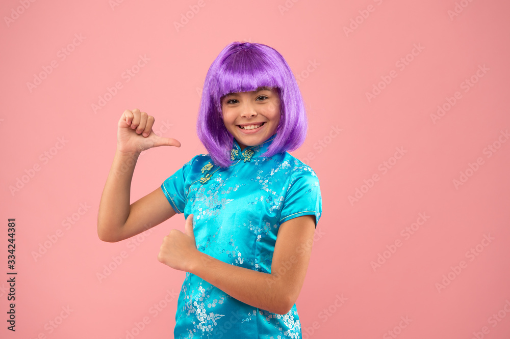 asian girl pointing finger. small chinese girl in purple wig. happy kid in traditional Chinese gown. chinese new year. stylish child in kimono. child wear national robe. festival day in Japan asian girl pointing finger. small chinese girl in purple wig. happy kid in traditional Chinese gown. chinese new year. stylish child in kimono. child wear national robe. festival day in Japan