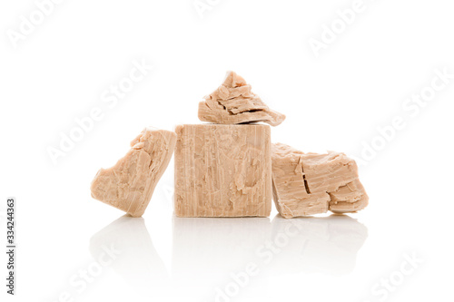 Yeast cubes for bread making isolated on white background.