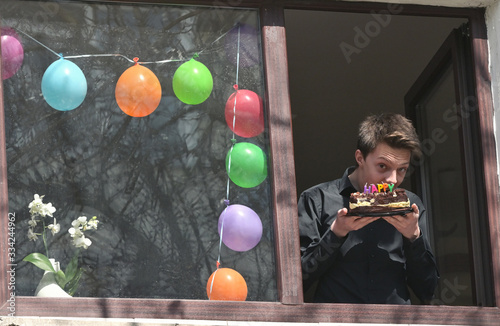 Young boy isolated on his 18Th Birthday photo