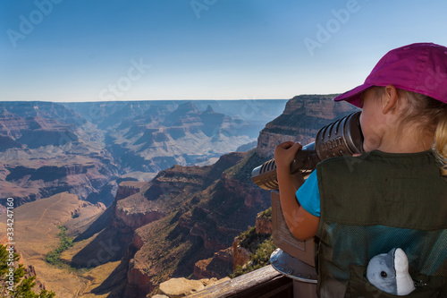 Little Girl Looking Through Telescope at Lookout Studio, South Rim,  Grand Canyon National Park, Arizona, USA