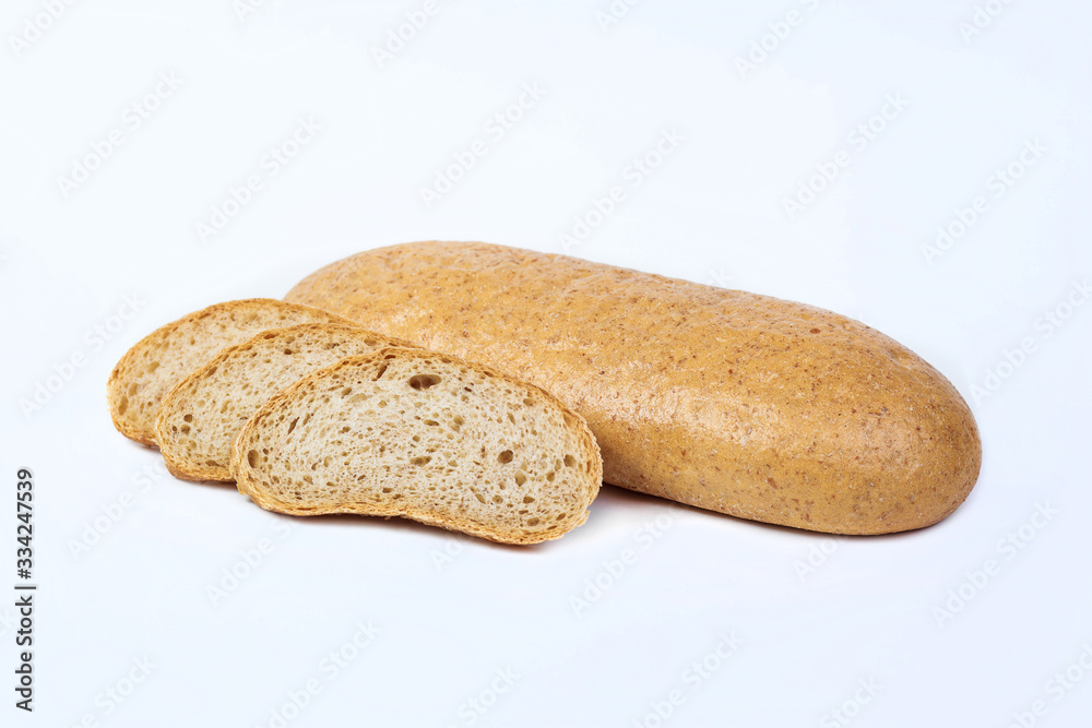 Fresh bakery product. Bread. Yeast bran loaf isolated on white background. Top view and copy space for text.