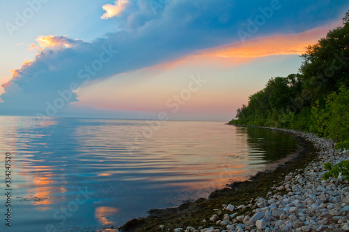 Sunset on Rocky Beach on Green Bay  Lake Michigan at Olde Rock Quarry County Park  Sturgeon Bay  Door County  Wisconsin  USA