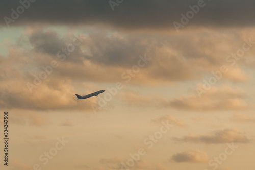 Passenger airliner during take-off in the clouds.